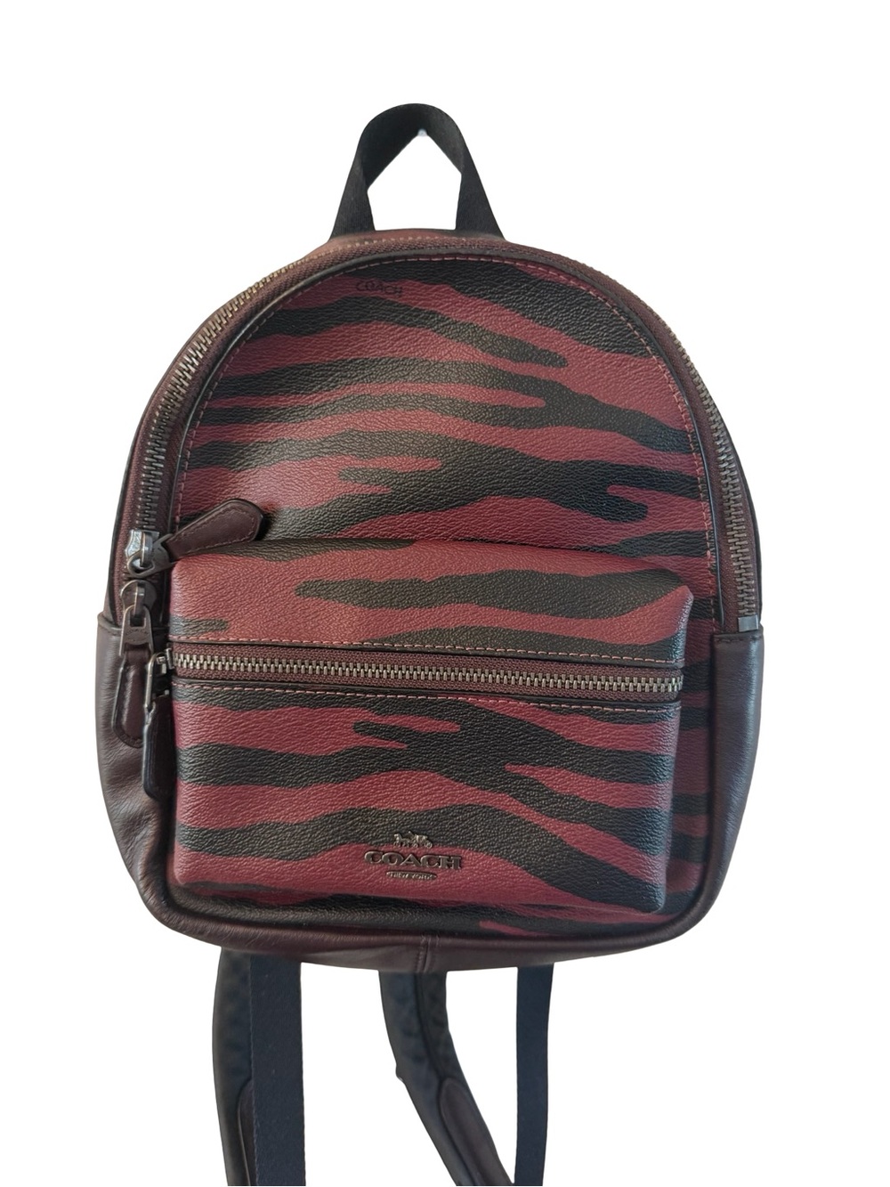 Coach Mini Charlie Backpack featuring a burgundy and black animal